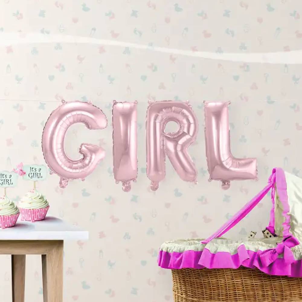 Babykamer met cupcakes wiegje en folieballon girl roze