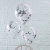 Drie transparante ballonnen met daarin zilveren confetti vastgemaakt aan een stoel