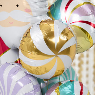 Bundel met folieballonnen met snoep opdruk en kerstman