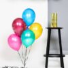 Set ballonnen in verschillende kleuren met de tekst 'happy birthday'