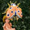 folieballon lieveheersbeestje met gouden poten en bloemen