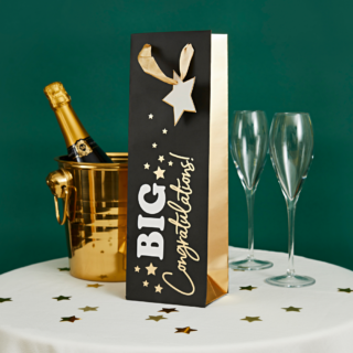 Cadeautas in het zwart en goud met de tekst big congratulations