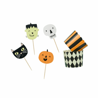 cupcake versiering halloween figuurtjes zoals een pompoen, zwarte kat, frankenstein en een skelet