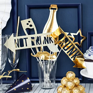 gouden en witte photo booth props