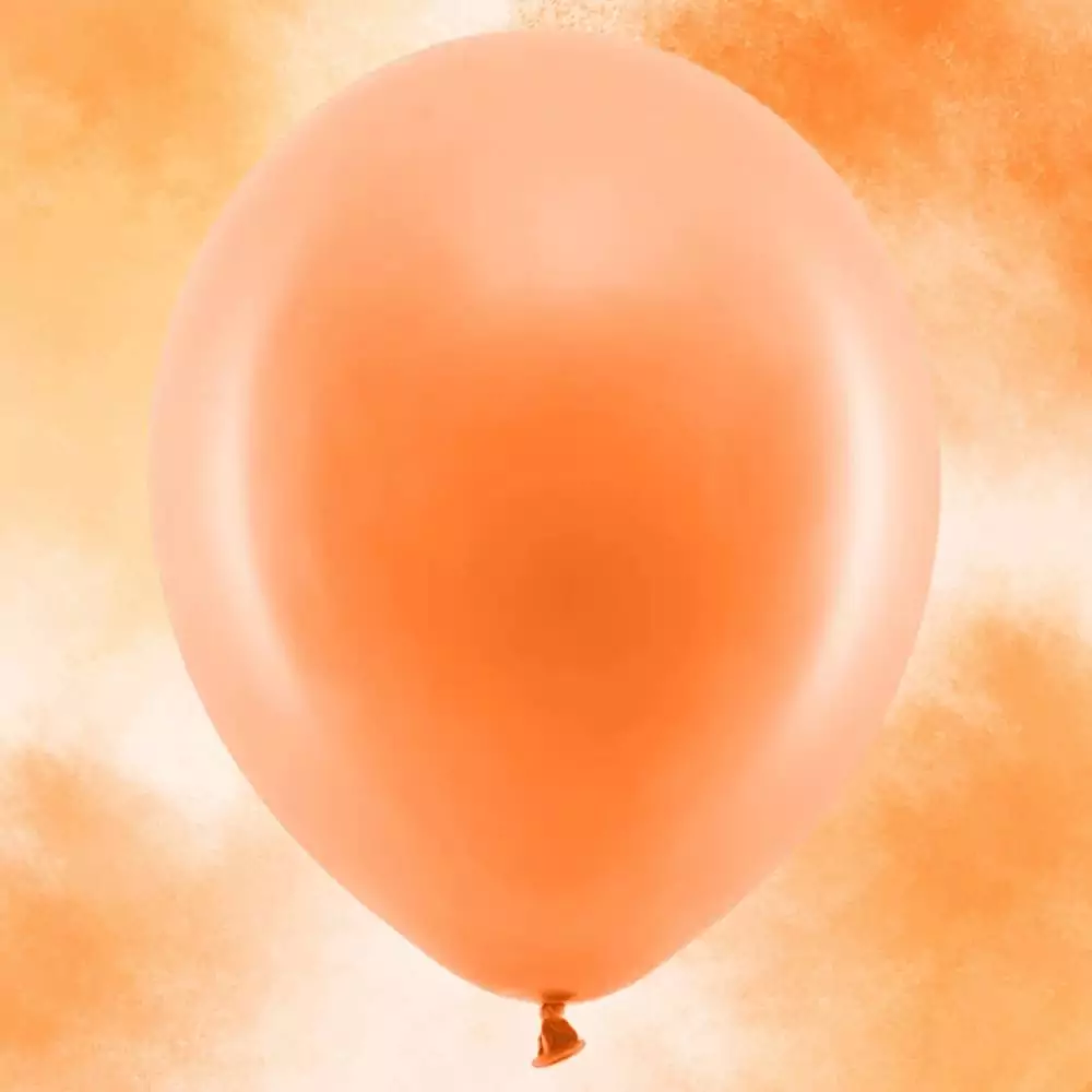 Oranje latex ballon op oranje achtergrond