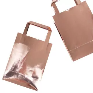 Glanzende rose gouden tasjes