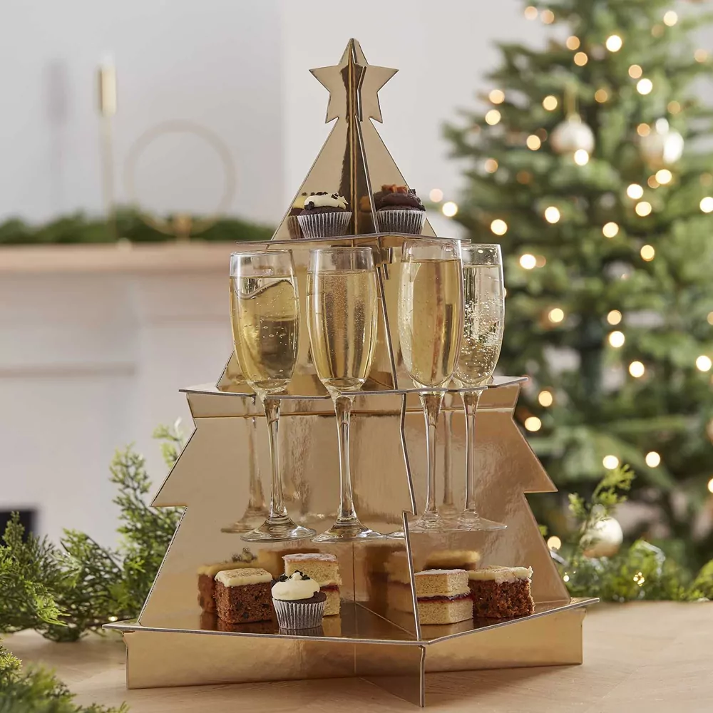 Hapjes & Drankjes Standaard in de vorm van een kerstboom met champagne fluitjes en hapjes