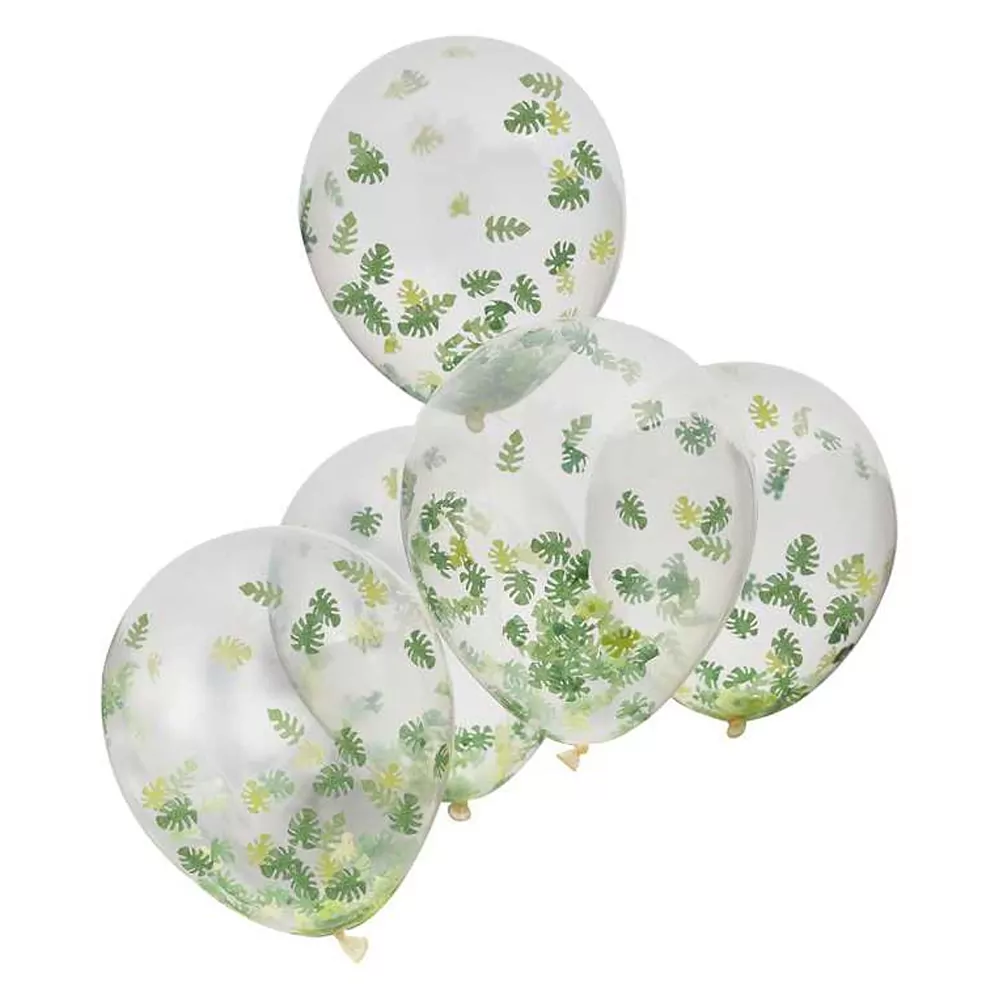 ballonen gevuld met confetti in de vorm van palmbladeren