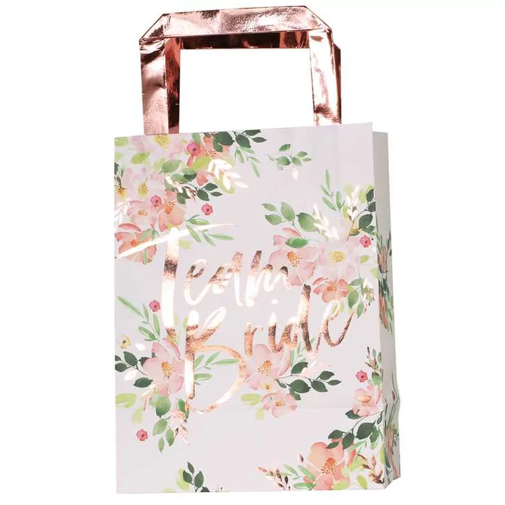 witte tasje met team bride erop met rose gouden handvat