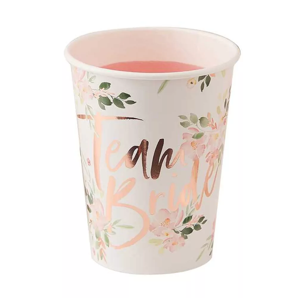 witte beker met bloemen en rosé gouden team bride tekst