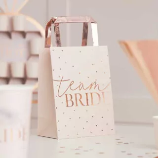 roze tasje met rose gouden handvat met team bride