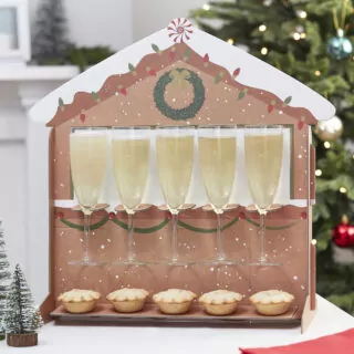 Standaard in de vorm van een kerstkraam voor champagne