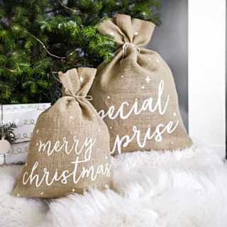 jute zak met de tekst merry christmas