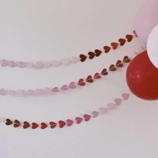 Ombre slinger met hartjes in het rood en roze