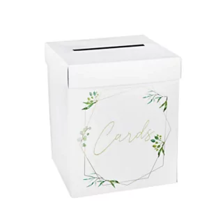 Witte doos met gouden geometrische vormen en de tekst cards versierd met groene blaadjes