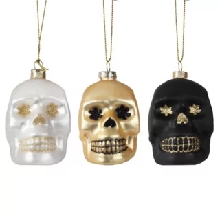 Kerstballen in de vorm van doodshoofden in het zwart, goud en wit mte glitters