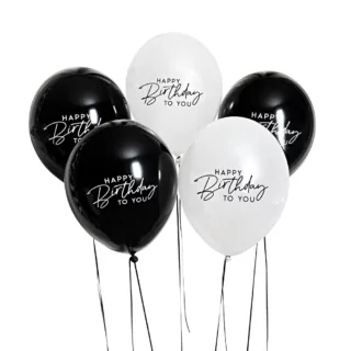 zwarte en witte ballonnen met de tekst happy birthday to you