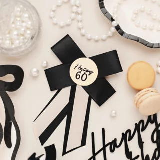 zwart met creme strik happy 60