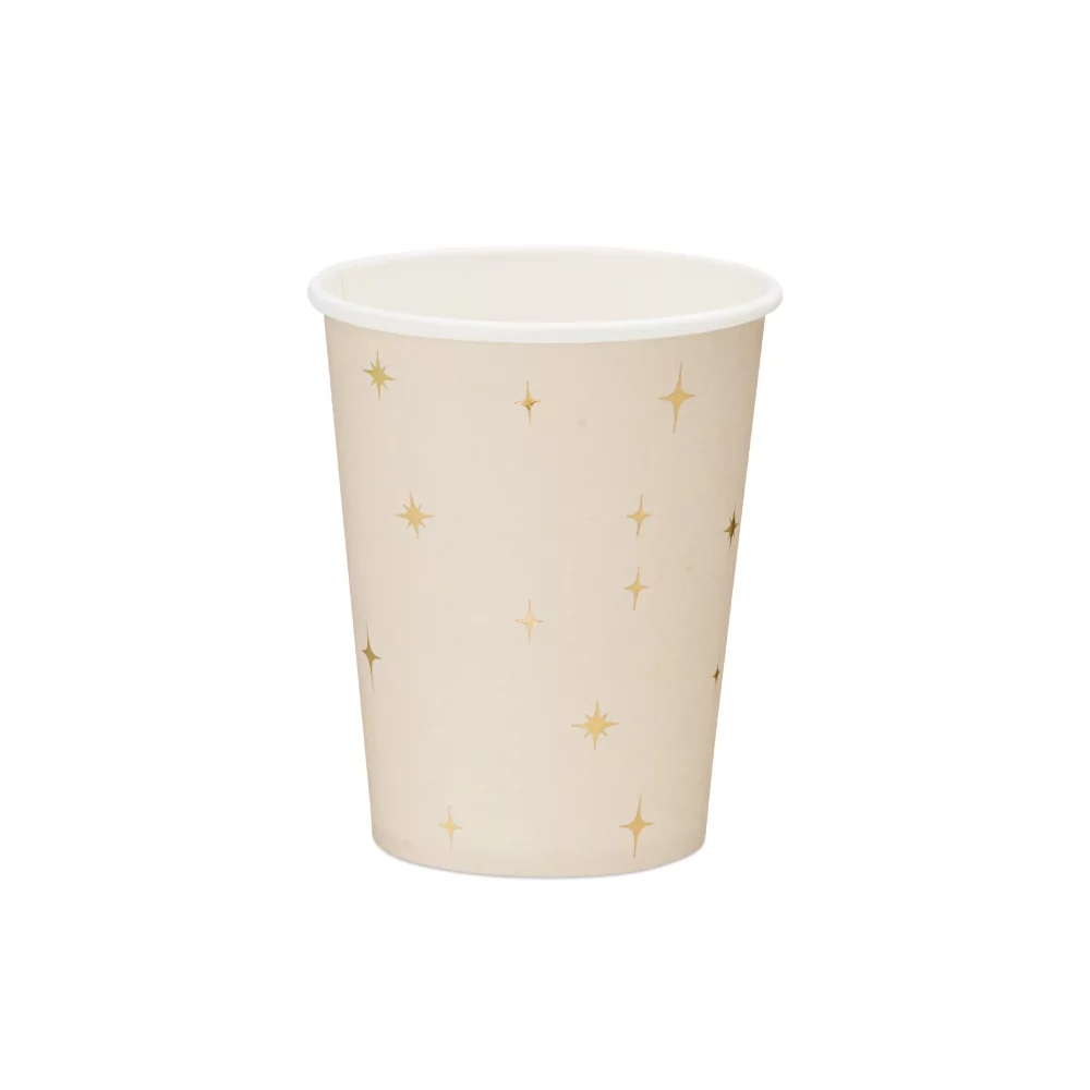 beige beker met gouden sterren